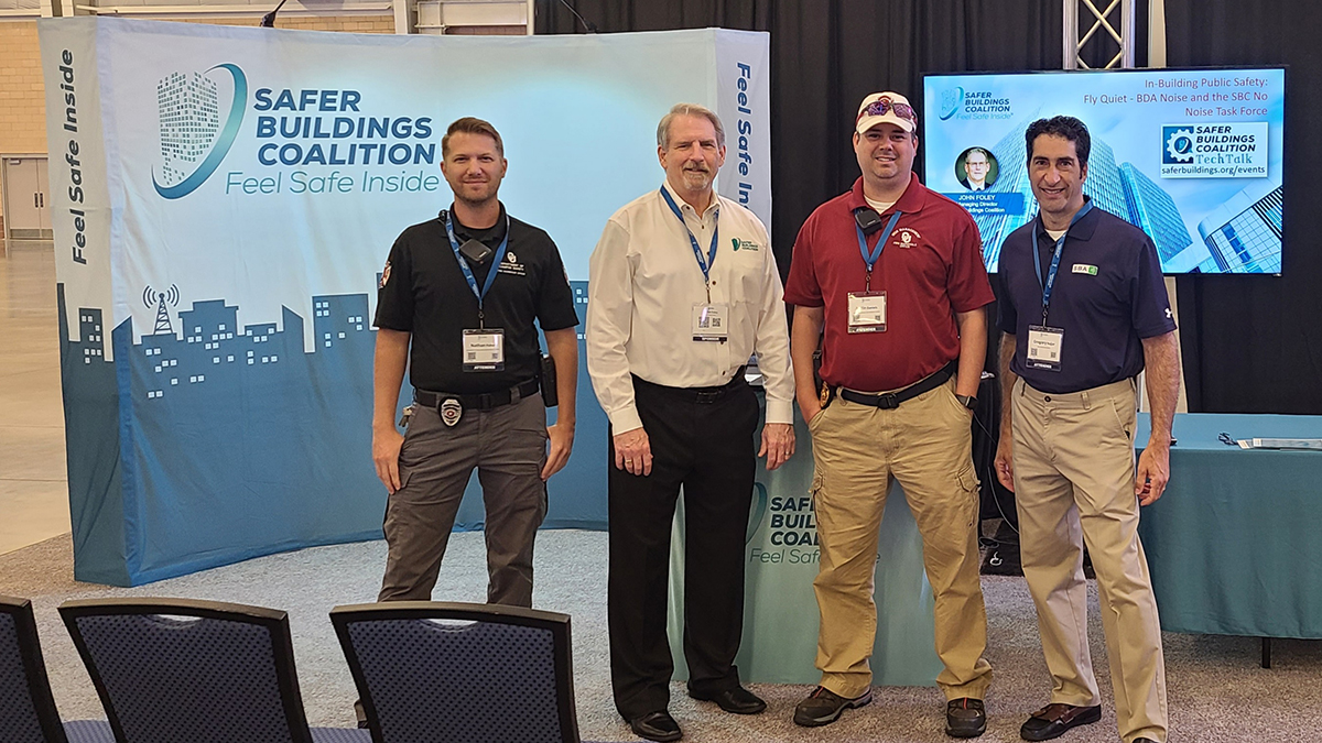 SBC exhibiting & connecting @ Wireless Oklahoma. L-R Nathan Fisher – OU; John Foley – SBC; Justin Daniels – OU Fire Marshal and President of the CCFS; Greg Najjar - SBA