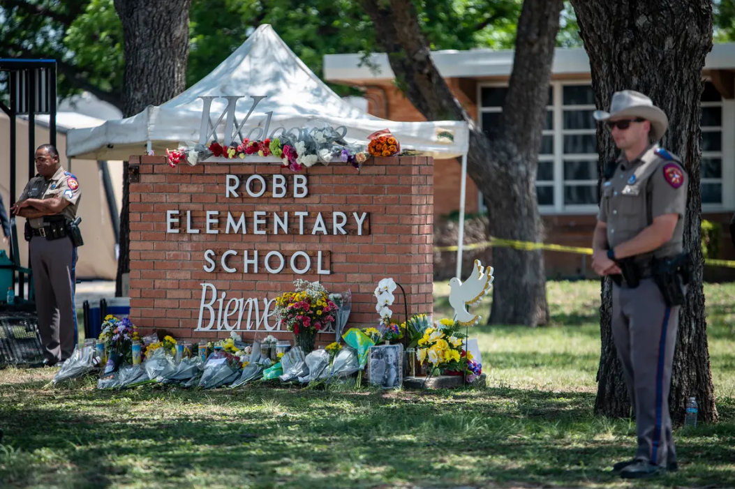 Law enforcement personnel work at the scene of a mass shooting in Robb Elementary School in Uvalde, Texas, May 25, 2022. (Sergio Flores for the Texas Tribune)